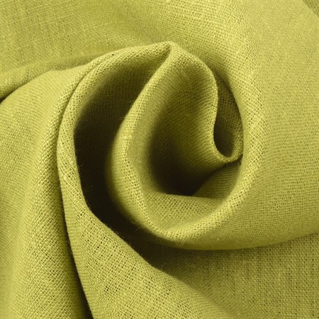 grönt linnetyg till kläder och inredning